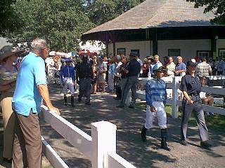 Jockeys head to the paddock