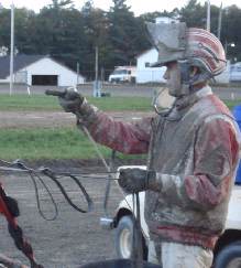 Mud-covered driver Jason Bartlett in winner's circle, R9, Cumberland, 9/29/06