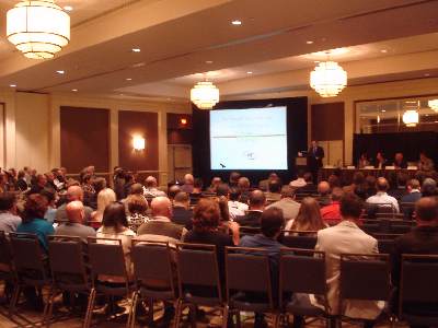 2009 International Simulcast Conference, panel, from left, Scherf, at podium, and sitting, True, Dobbins, Hill and Linnell, 10/12/09